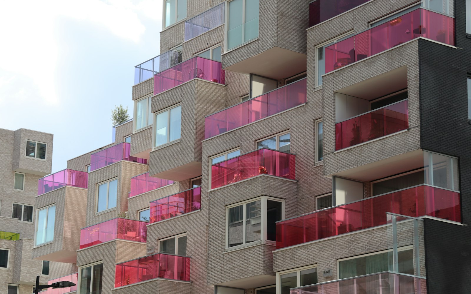 Modern apartment building with coloured balconies in Amsterdam